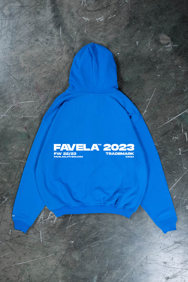 Royal Blue streetwear zip hoodie with Favela 2023 backprint