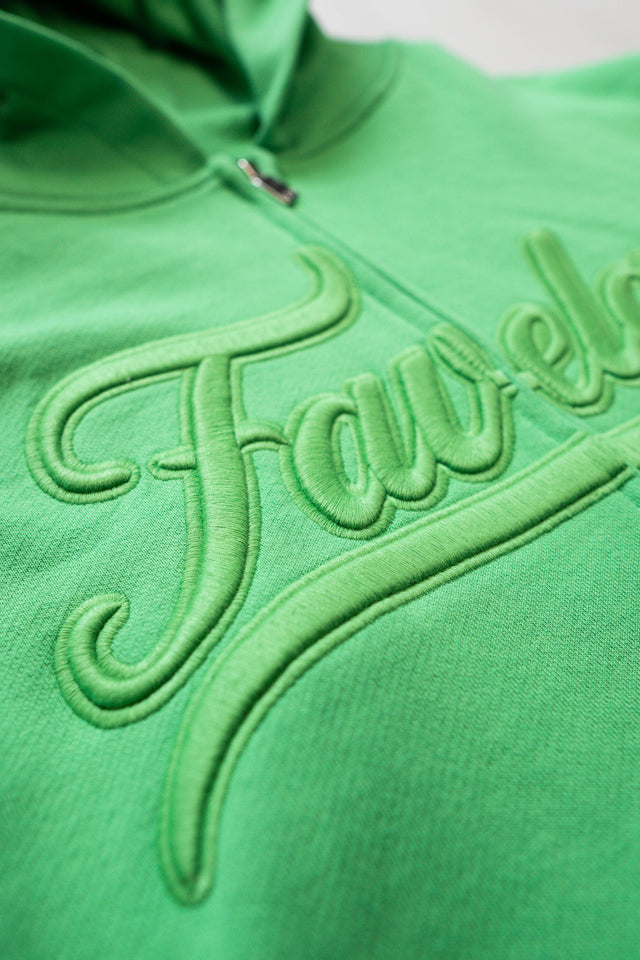3D Favela Clothing Signature Logo on the Chest of an apple green frontzip Hoodie
