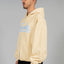 Side view of Cream Front Zip Hoodie by Favela with 3D Logo 
