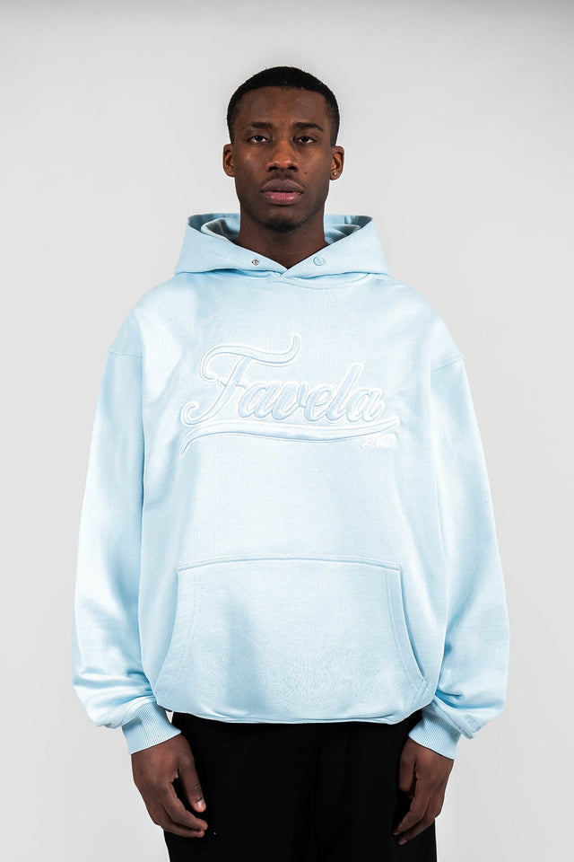 Favela Clothing Model wears an Ice Water Snap Button Hoodie