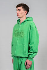 Favela Clothing Model wears the Apple Green Zip Hoodie