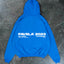 Frontzip Hoodie mit oversized Passform und in der Farbe Royal Blue liegt auf der Ablage